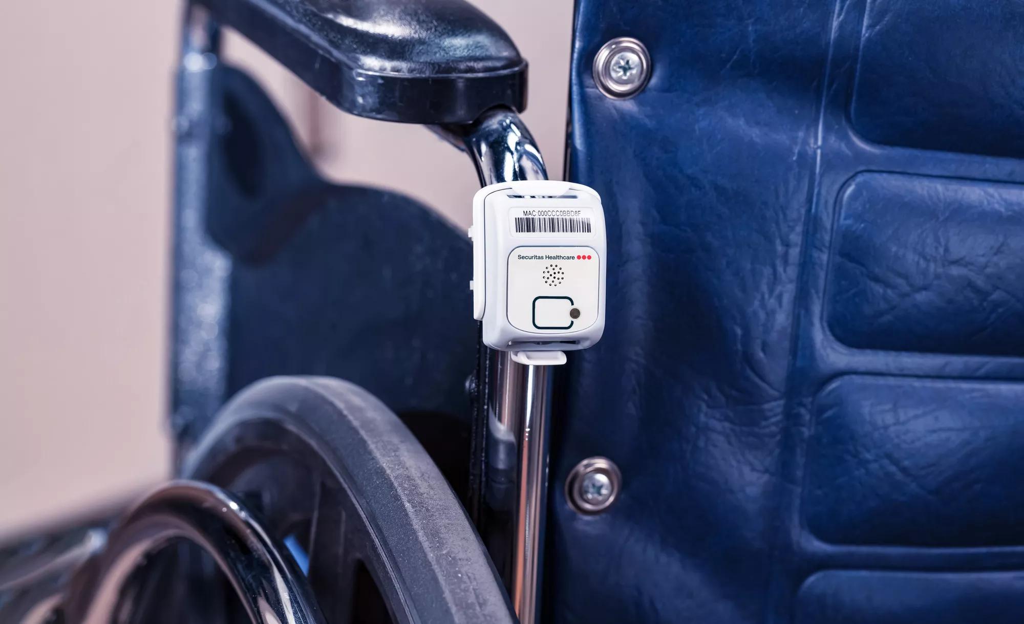T2su asset management tag attached to a wheelchair. Securitas Healthcare asset tracking.