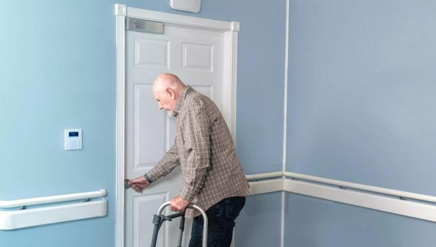 Memory care resident prevented from exiting building by WanderGuard BLUE wander management system