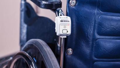 T2su asset management tag attached to a wheelchair. Securitas Healthcare asset tracking.